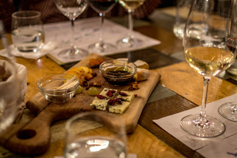 Wine tasting with cheese, bread and oil while enjoying wines in Hungary
