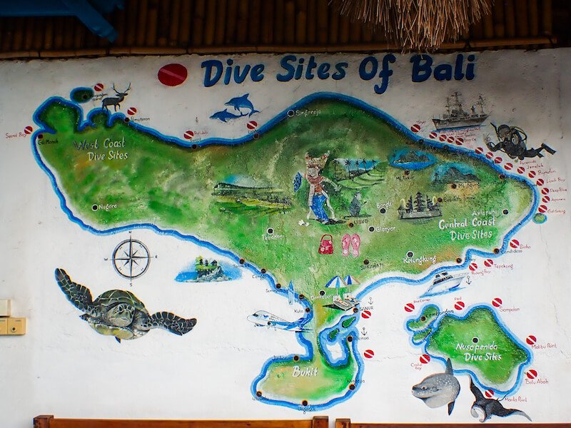 Sign showing all the different dive sites in Bali including the cluster of dive sites around Amed, Nusa, and Menganjan