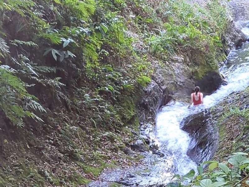 Allison Green going down the Waitavala Water slides while on vacation in Taveuni, Fiji