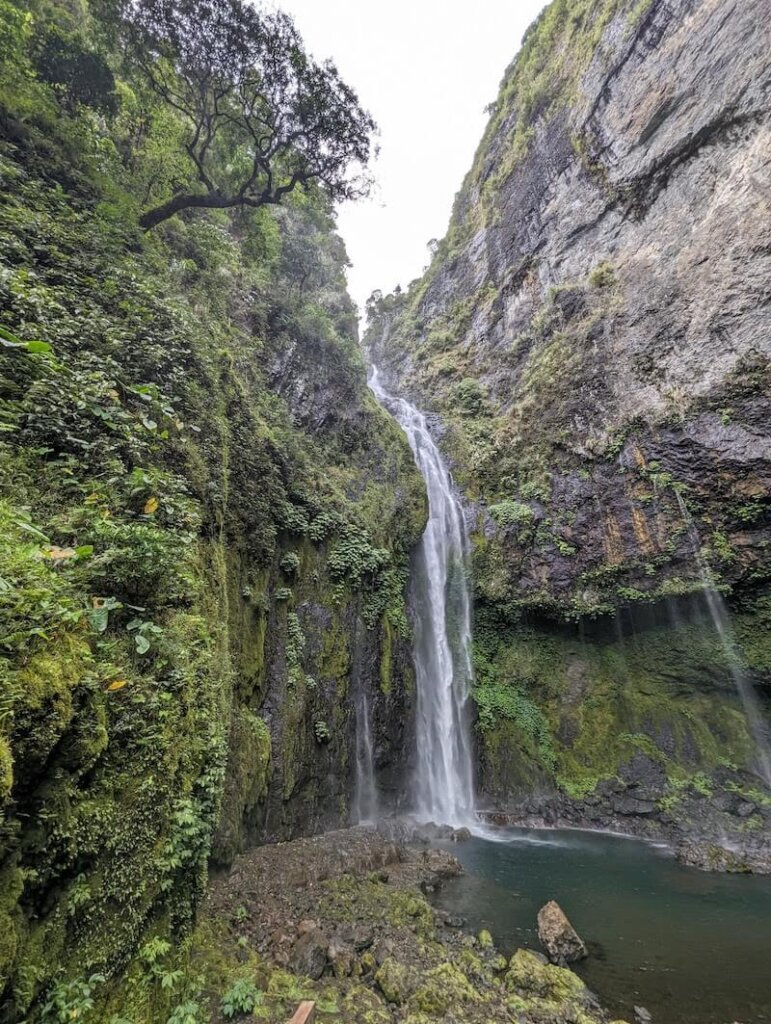 The massive height of Savulelele Waterfall as seen from afar, looking at the scale of the magnificent waterfall in Fiji