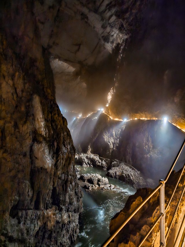 view of light coming in through crevices of the cave at skocjan caves in Slovenia