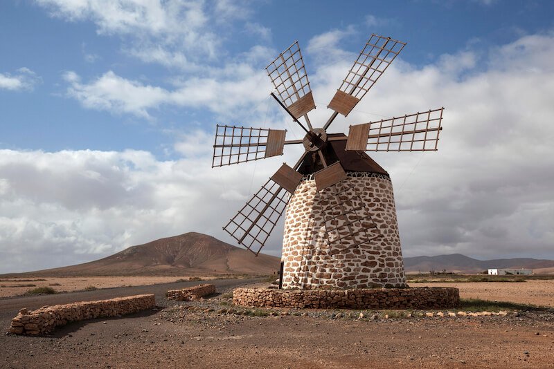 Windmill made of stone and wood and iron, called Molino de Tefía, in the landscape of Fuerteventura