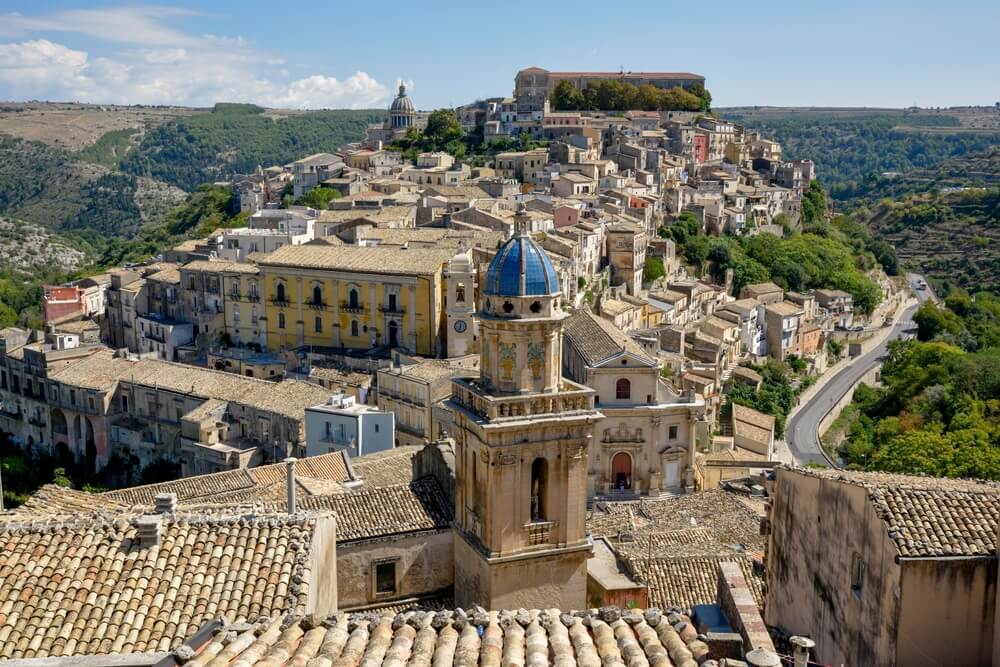 View from Ragusa Superiore to Ragusa Ibla on a sunny day where you can see the entire city laid out beautifully on a clear day