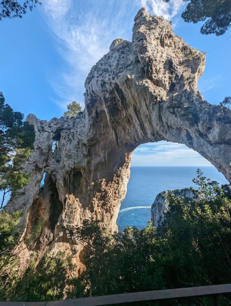 A huge rock arch that you can see when visiting Capri