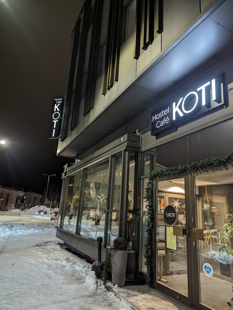 Sign for the exterior of Koti Cafe and Hostel