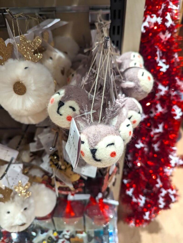 cute reindeer christmas ornaments in the shape of a ball with a smiling reindeer
