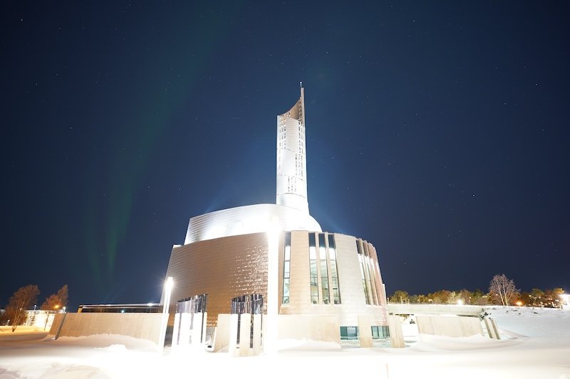 One small faint band of aurora over the northern lights cathedral