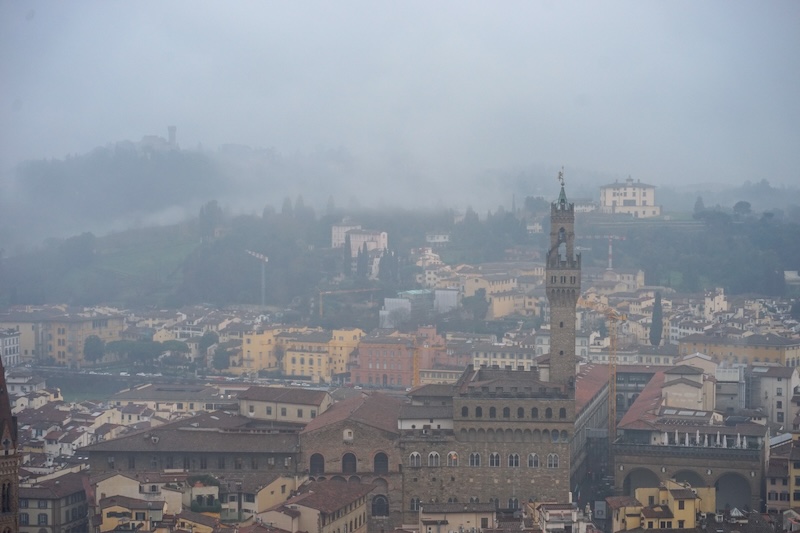 View of the buildings in the rain from florence duomo top of the climb