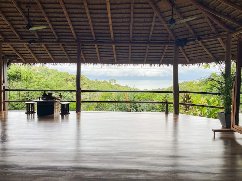 Empty yoga shala with views of the Pacific ocean
