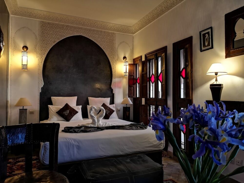 marrakech riad room with styling and stained glass windows
