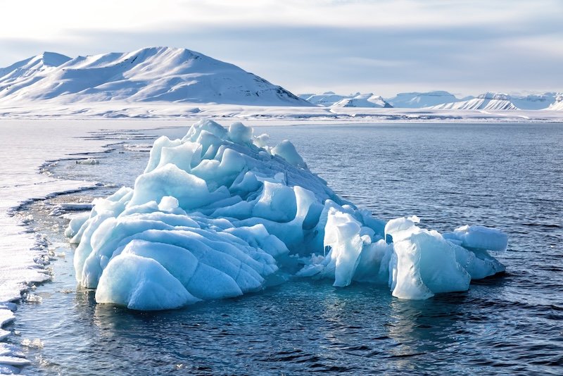 Glacial ice in one of the northern fjords off the coast of Spitsbergen in the summer months