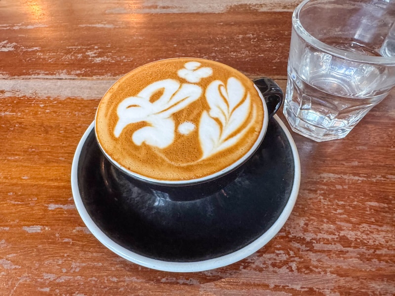 VCR coffee with a hummingbird and leaf design