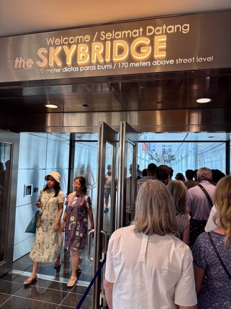 Sign for the skybridge at Petronas towers