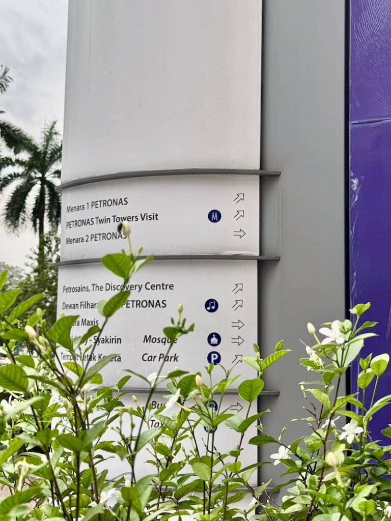The signs for the Petronas tower visit experience