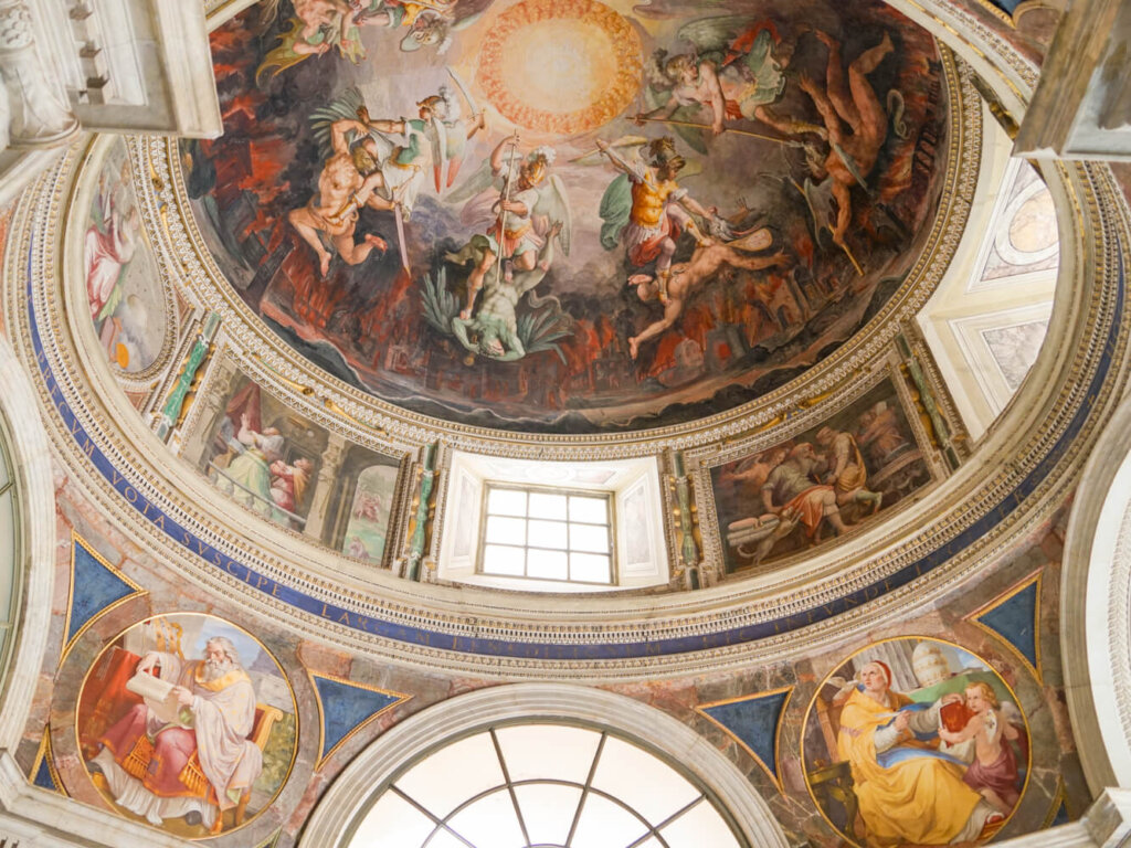 View of a painted cupola at the top of the dome in the Vatican building