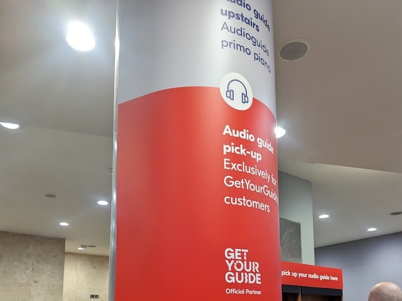 Sign for audioguide rental pickps in partnership with GetYourGuide