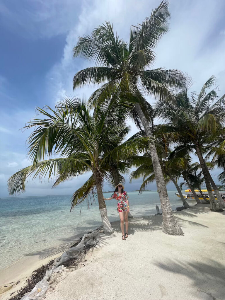 Allison Green in Panama, in San Blas islands, with boats and clear water behind
