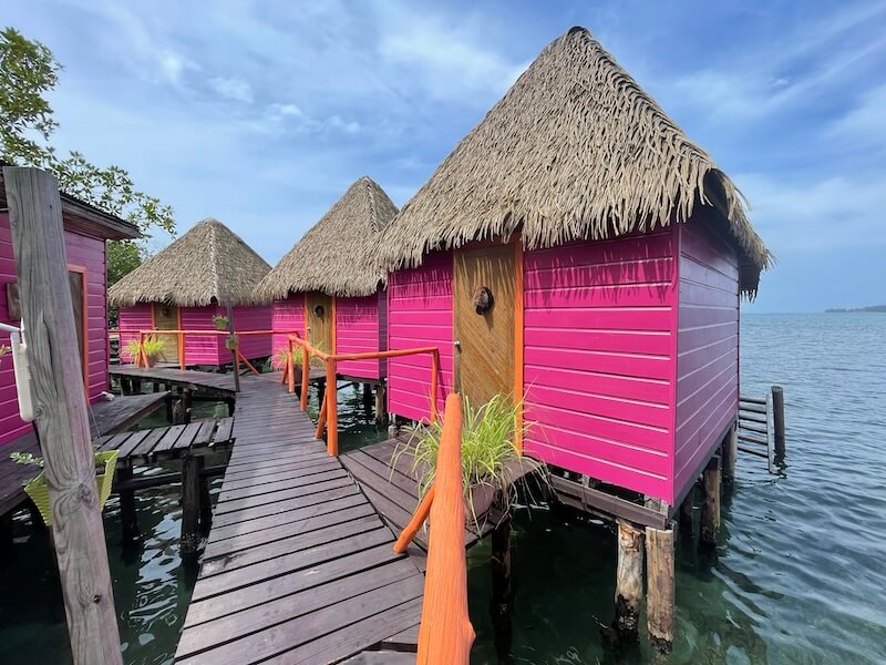 Pink overwater bungalows in Bocas del Toro