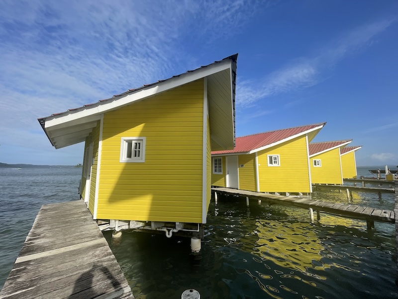 Yellow overwater bungalows in Bocas del Toro with beautiful aesthetic
