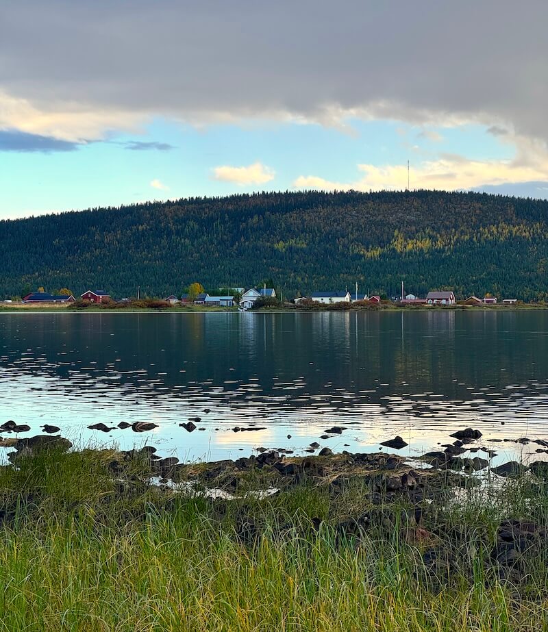 Autumn in Swedish Lapland in Jukkasjarvi on the reindeer lodge with lake and beautiful fall colors
