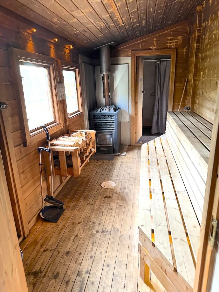 Sauna interior at Reindeer lodge during the day with no one inside it