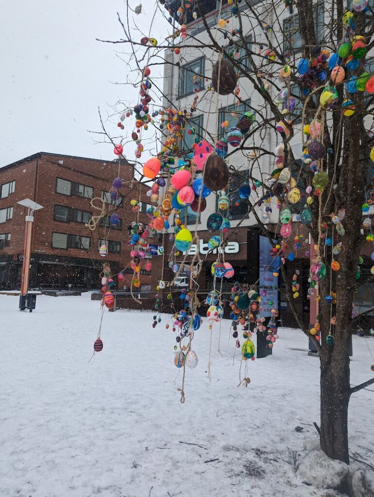 Easter eggs hanging from at ree