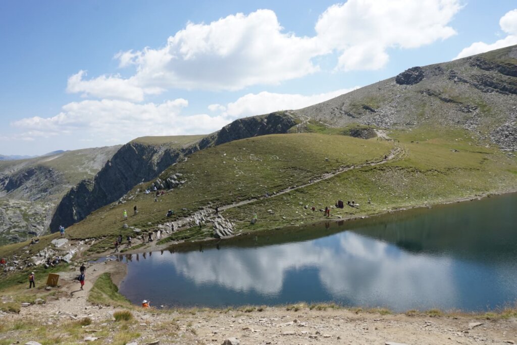 Glassy waters on one of the alpine lakes on Rila Mountain