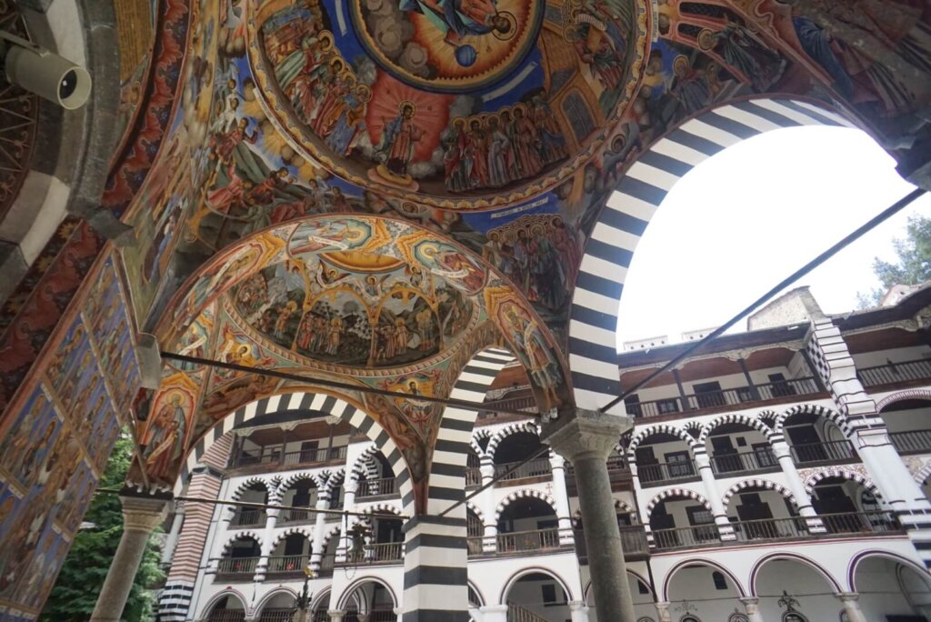 Architecture of Rila Monastery with the arches of the church as well as the monastery living quarters