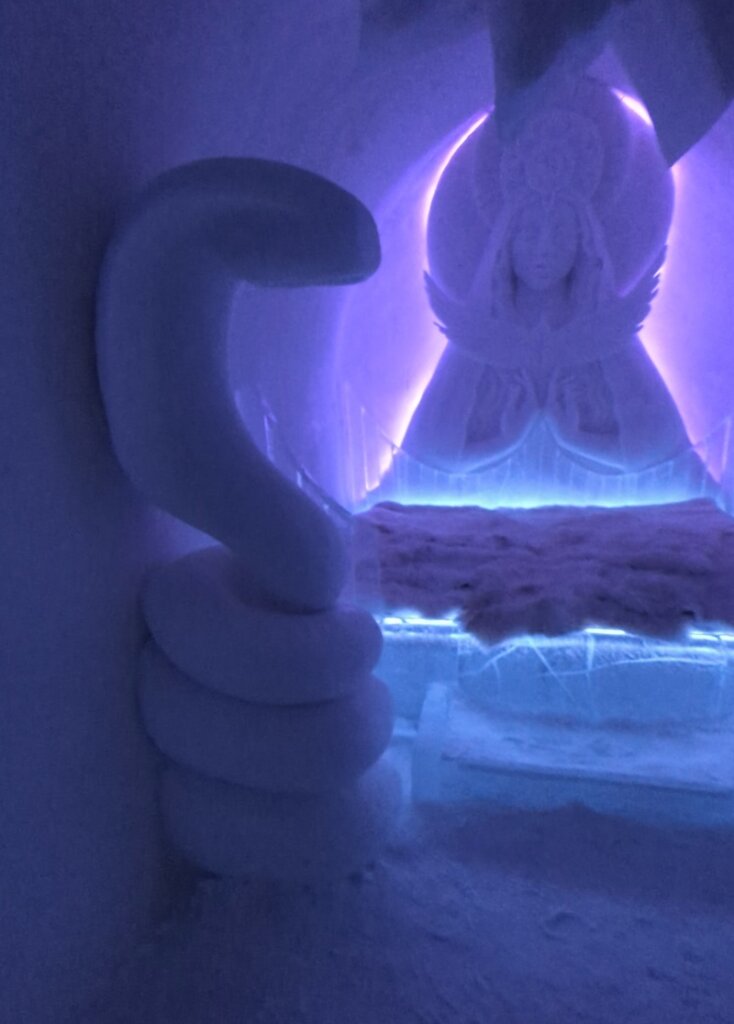 Sorrisniva Igloo Hotel with snake sculpture