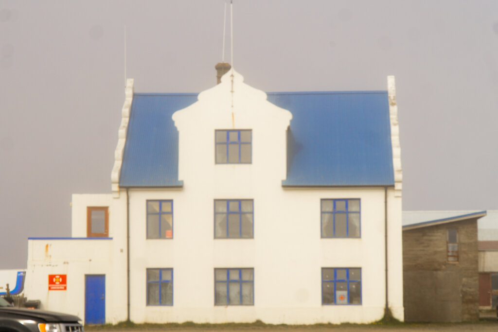 View of a building inside the town of Holmavik