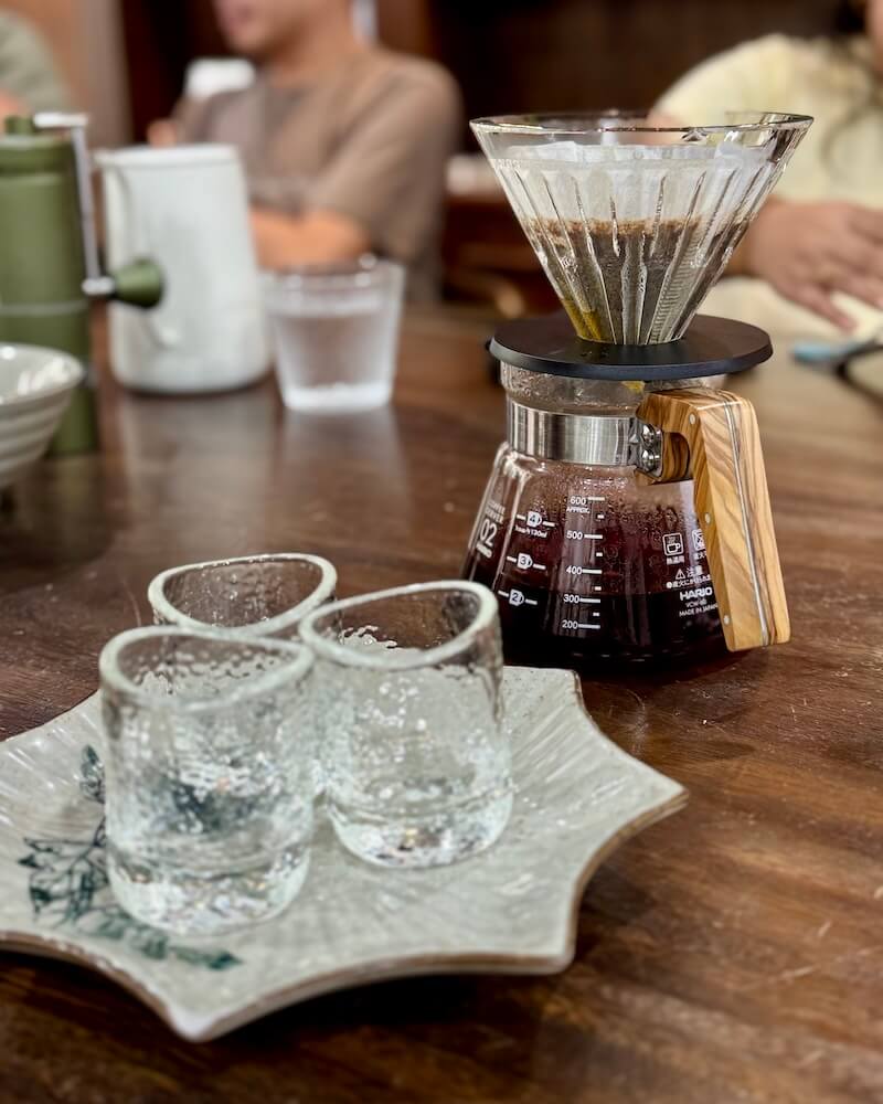 Pourover coffee and small glass cups to drink out of that help enhance the aroma