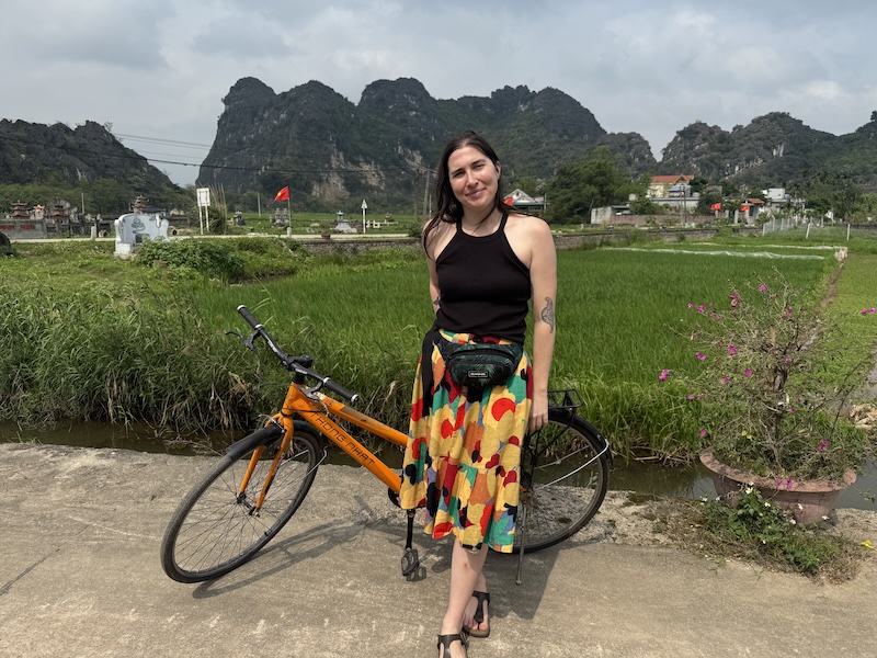 Allison Green during her Ninh Binh bike ride stopping at a mountain area