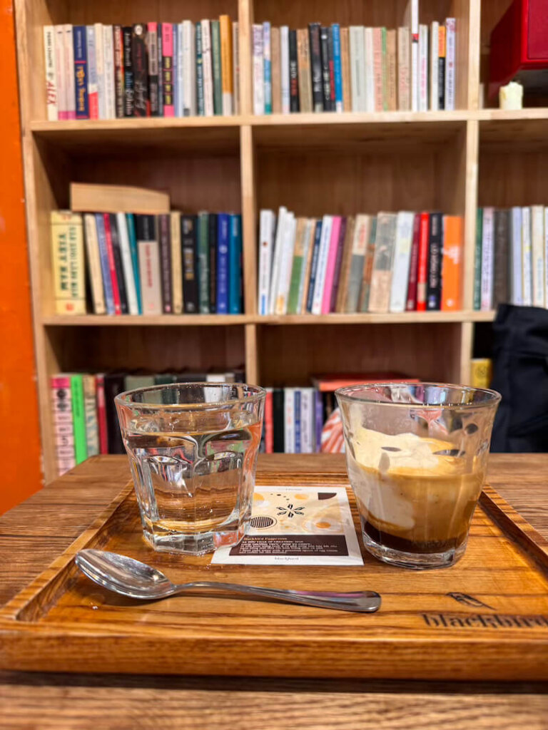 Interior and bookshelf in the famous Blackbird coffee shop in Hanoi