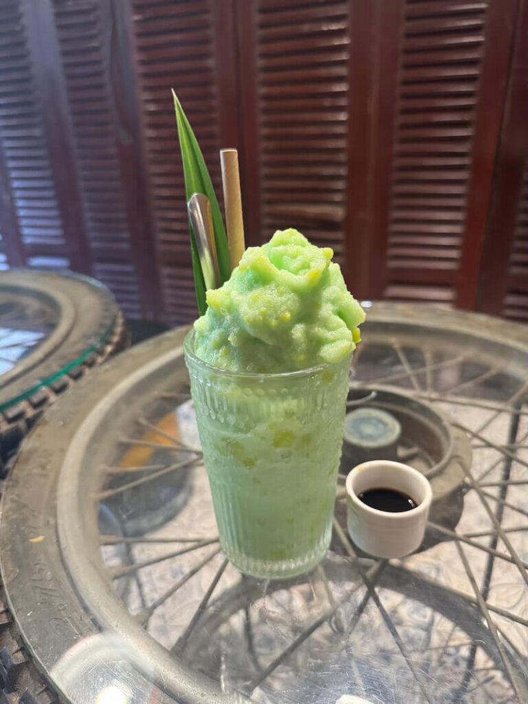 a pandan sticky rice coffee with espresso shot at hidden gem cafe