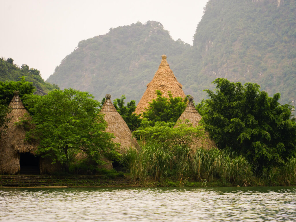Trang An boat with the set pieces from Kong Skull Island film