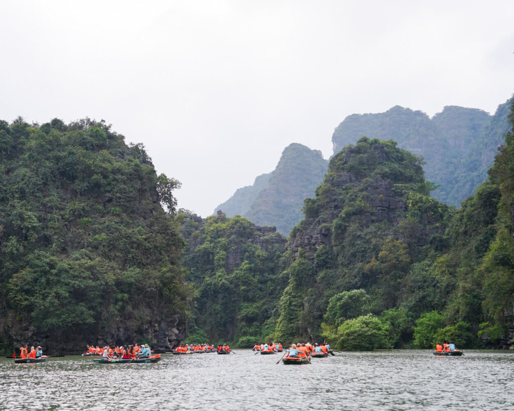 Crowded boats in the water in Trang An