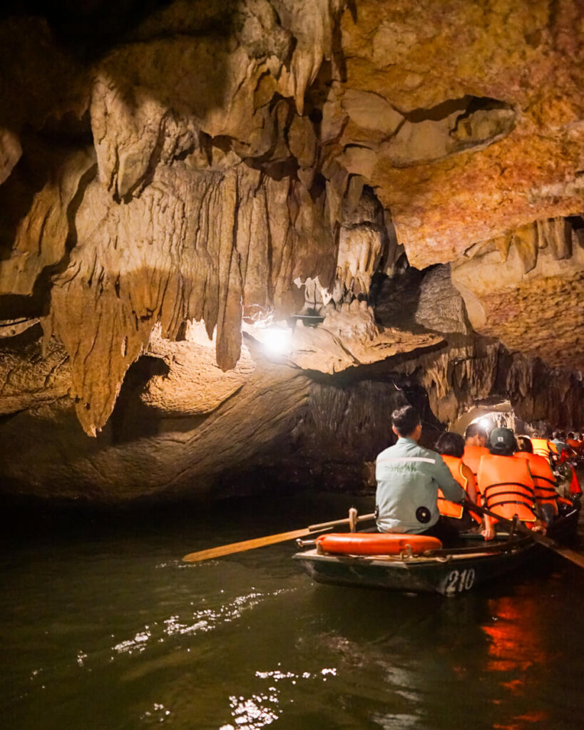 Trang An boats and caves with lanterns to light it up