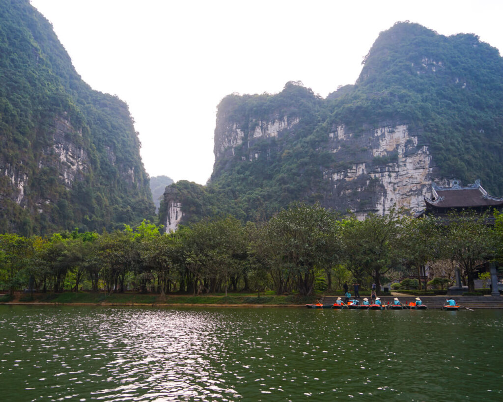 views of Trang An from the water with some boats visible