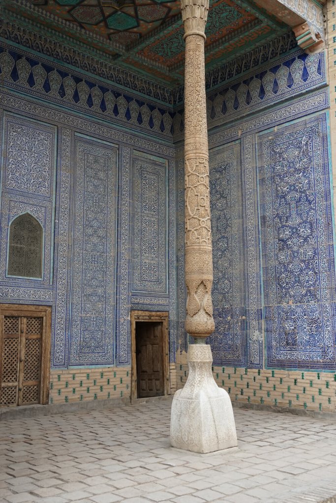 Interior courtyard with a wood pillar
