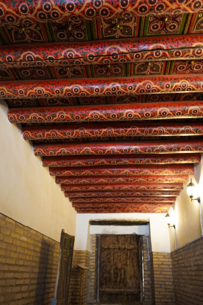 The hallway in Khiva Tosshovli palace with its beautiful colors