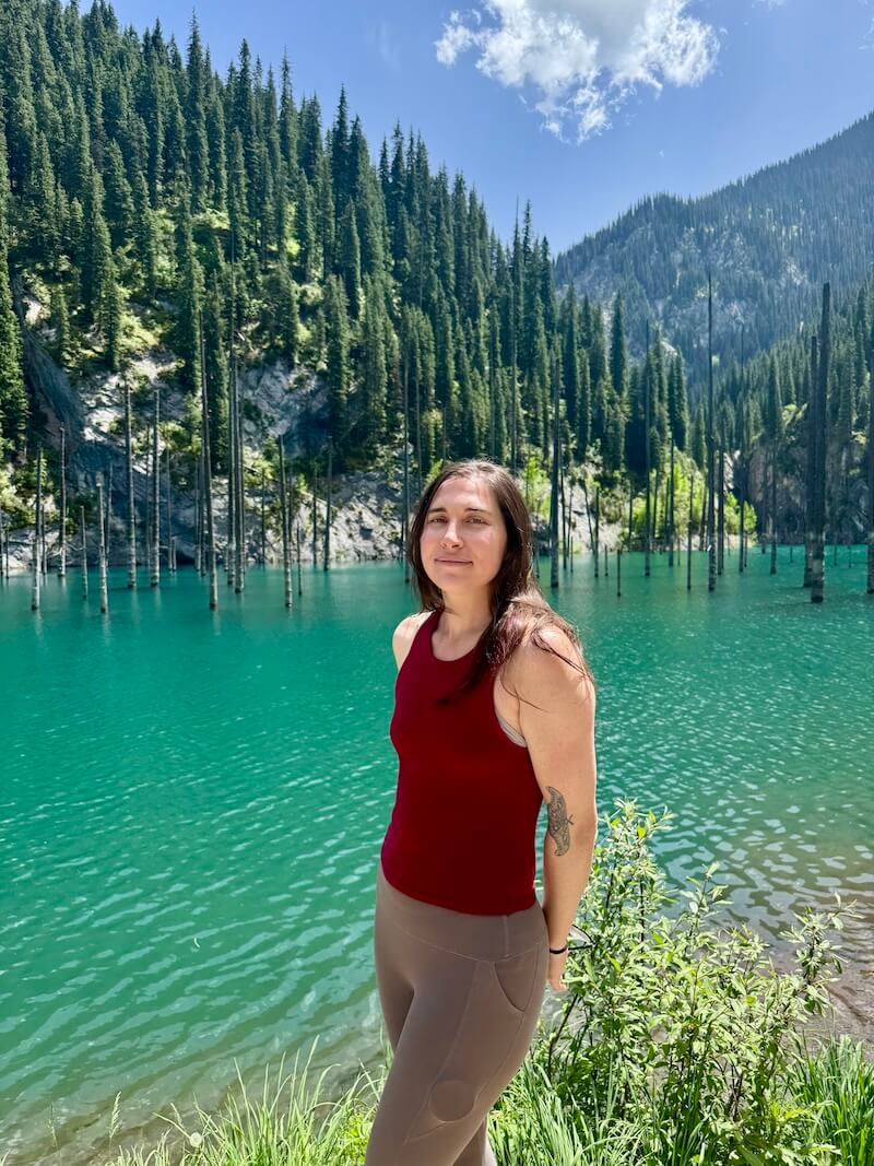 Allison Green, the author of the article, visiting Kaindy Lake in Kazakhstan