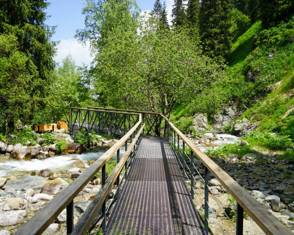 Metal grating walkway through the gorge leading the way to the hot springs