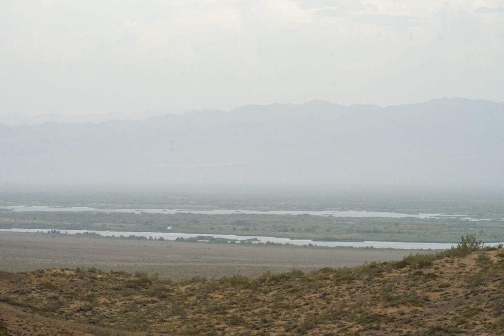 Views behind the sand dune, rivers and lake in the distance