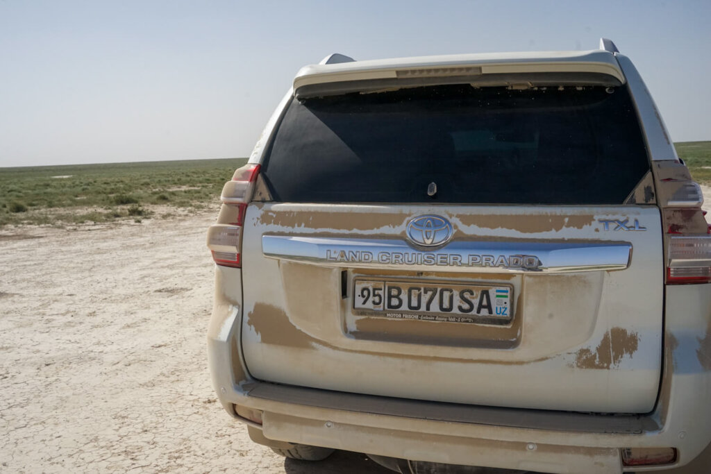 Dust collecting on the 4WD SUV we were driving in