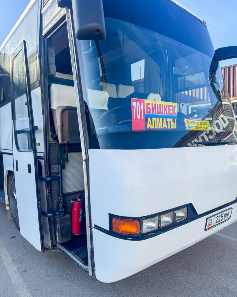 701 bus to Almaty, written in Cyrillic lettering