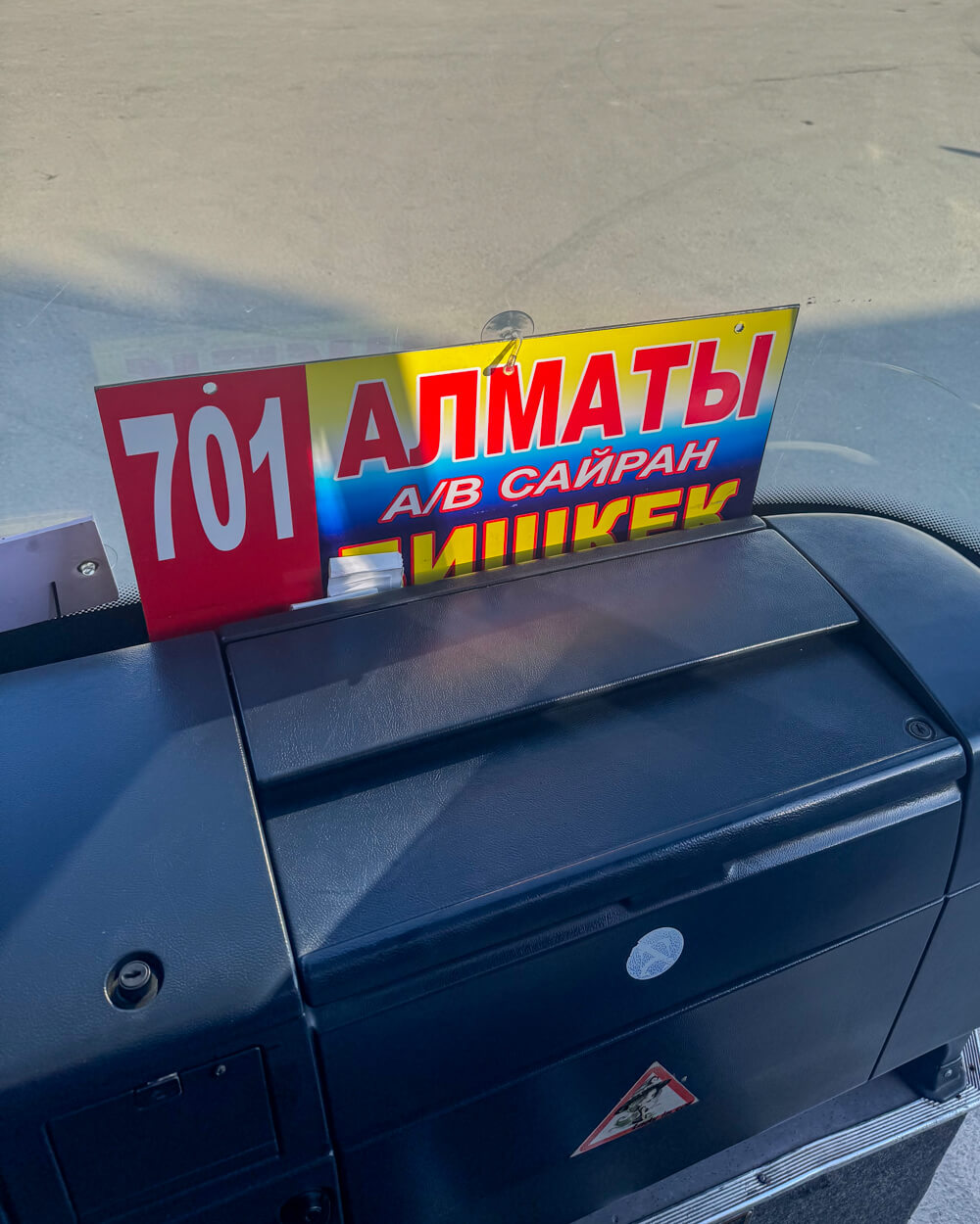 701 bus to Almaty, written in Cyrillic lettering