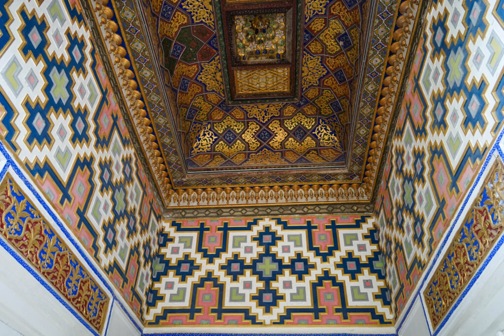 Room's ceiling when you look up towards the ceiling, as you enter the hexagonal building
