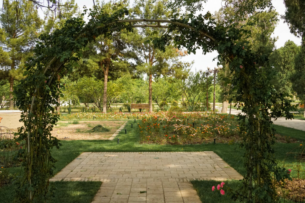 An arched trellis within the palace grounds encouraging people to walk around and follow the path