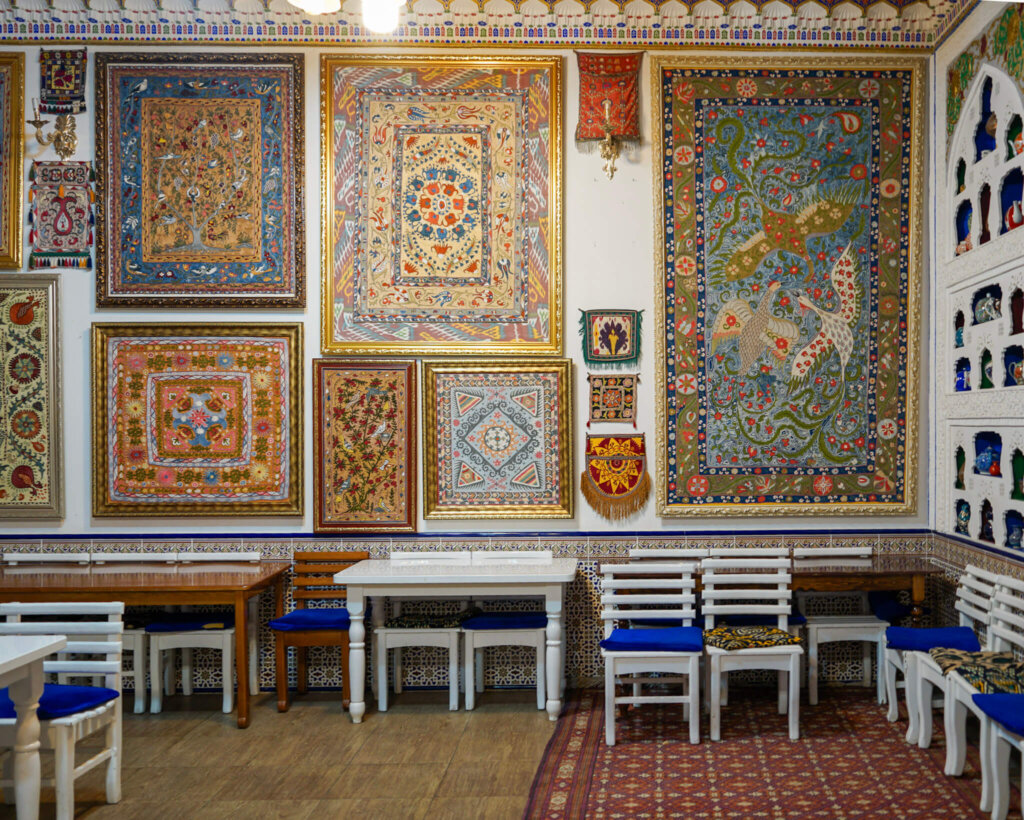 Suzani artworks hung up on the walls of the suzani gallery