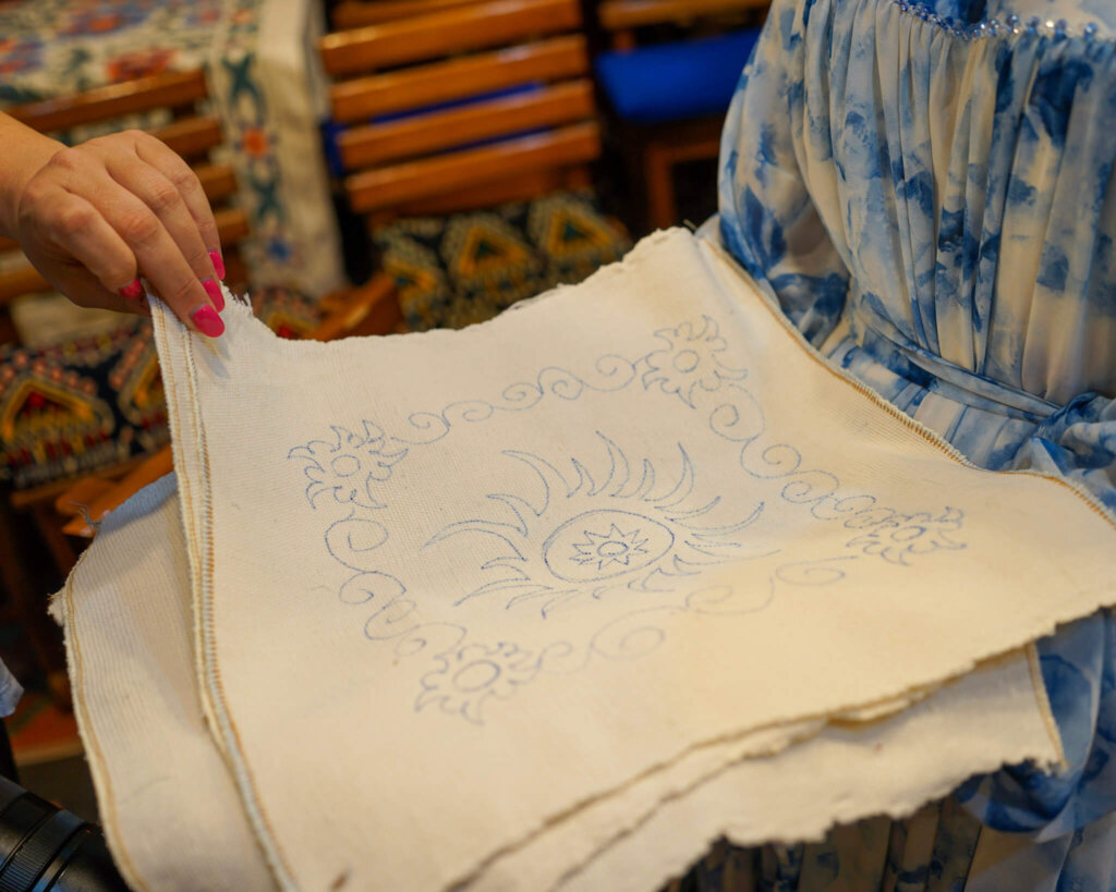Choosing from a handful of different patterns and motifs for our suzani